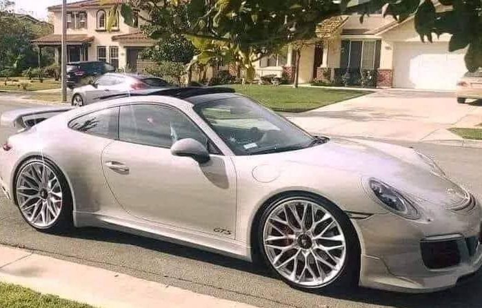 A 17-year-old boy who works part-time at Pizza Hut drives up to park in front of the house in a beautiful Porsche