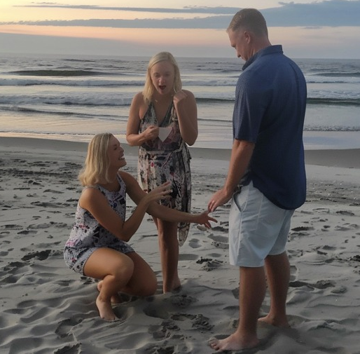 While on the Beach with My Husband, a Woman Ran Up, Knelt, and Said His Name