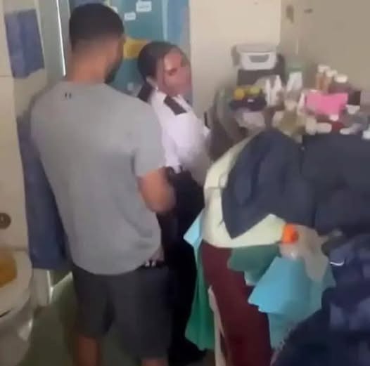 Prison officer who was filmed…..